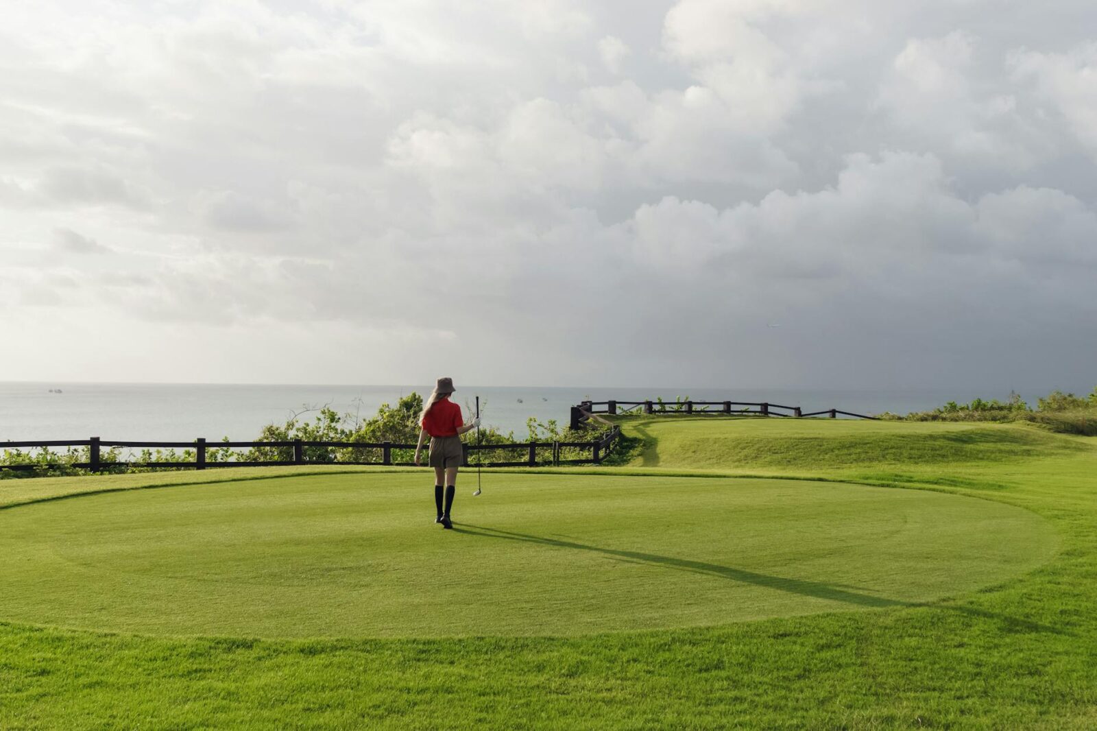 Golf tourism is booming — here’s how traveling golfers are cutting costs on the course - Photo by Mikhail Nilov on Pexels