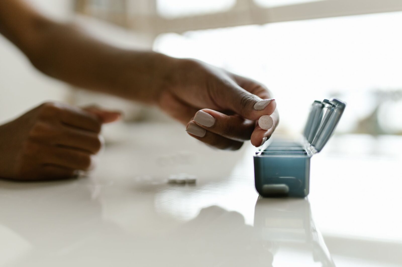 I Always Travel With This Compact Pill Case—And It's Only $6 (2026) - Photo by RDNE Stock project on Pexels