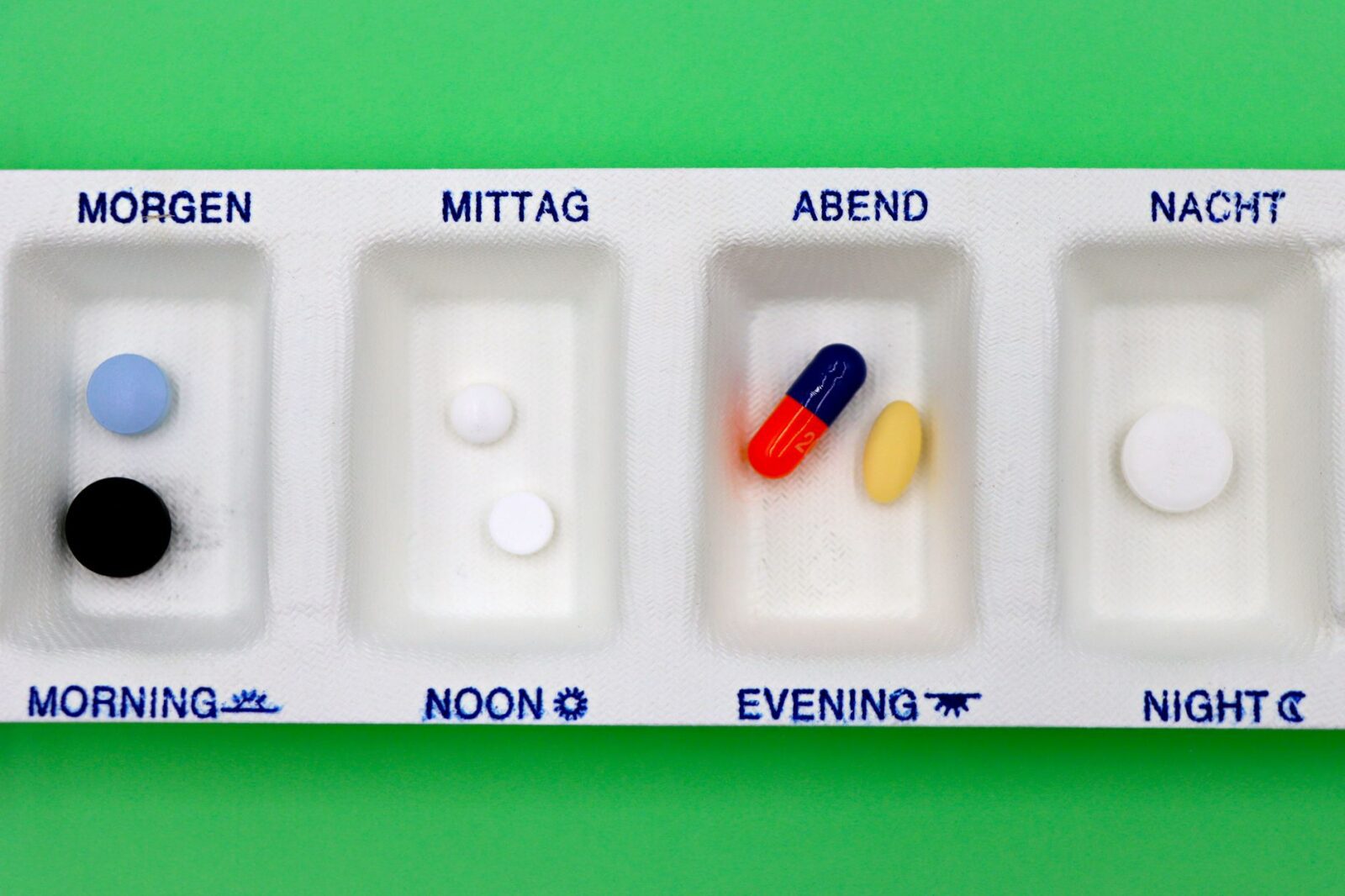 I Always Travel With This Compact Pill Case—And It's Only $6 (2026) - Photo by Marta Branco on Pexels