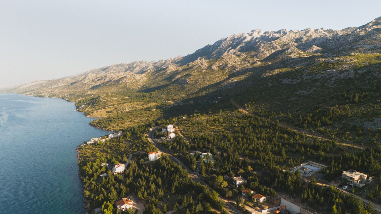 This Tiny Beach Town Is Called the ‘Caribbean of Europe’ With the Bluest Water in the World—and Summer Weather Lingers Well Into Fall - Photo by Nici Gottstein on Pexels