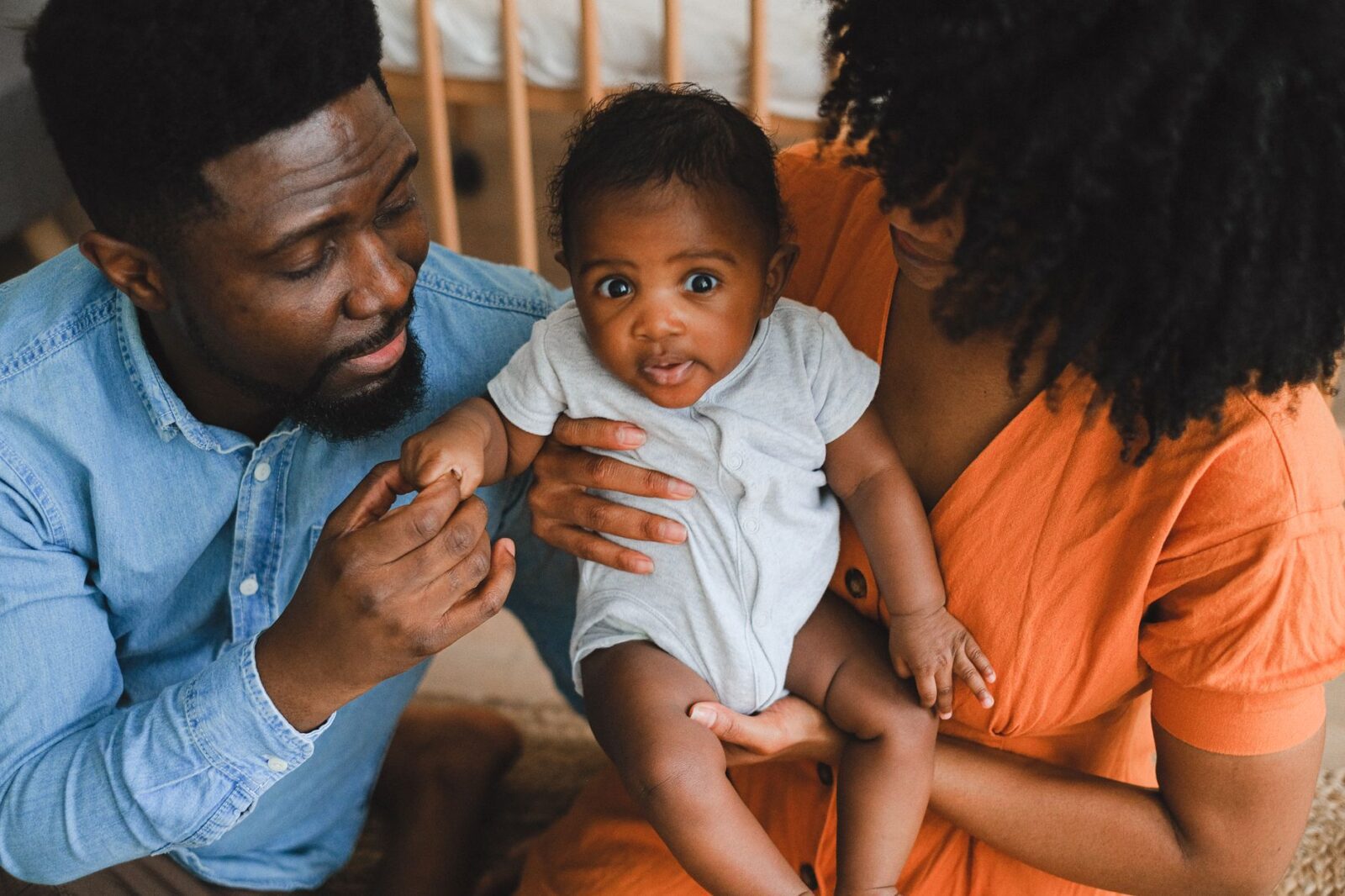 Baby on board: Alaska Airlines Atmos Rewards just made it much cheaper to fly with lap infants on award tickets - Photo by Anna Shvets on Pexels